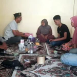 Kh sukiyanto baju putih berpeci saat mendatangi rumah widi di gununggangsir beji sabtu 88 zhguf